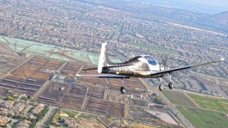Mooney M10 first flight
